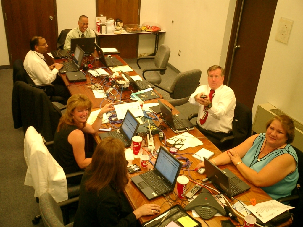 2015/08(August)/ERM-Maryan-Ro-retirement-party-in-Denver/Rocchi-Retirement-Pics/1024x768_(Most of) assessment team in conference room.JPG